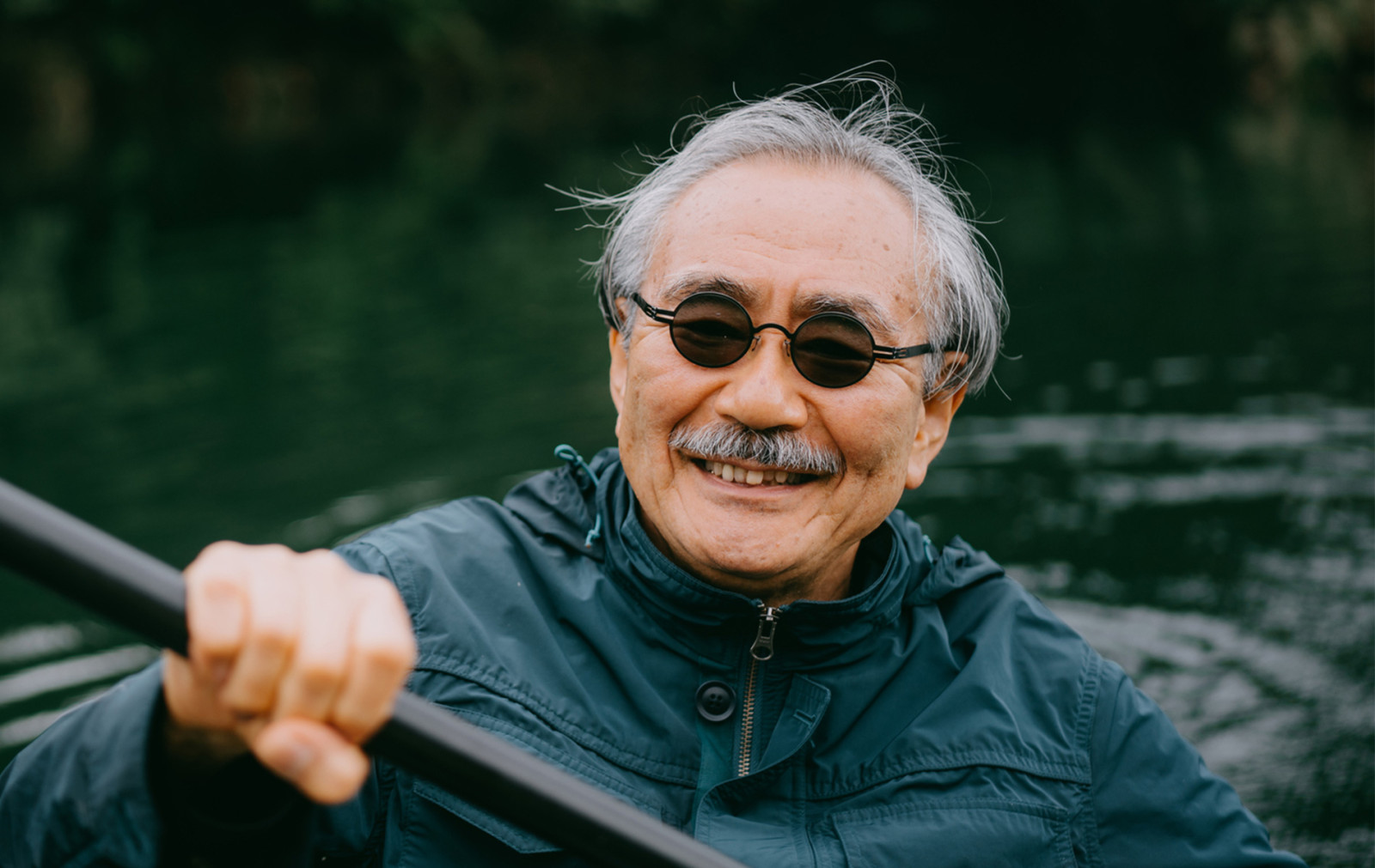Elderly man kayaking
