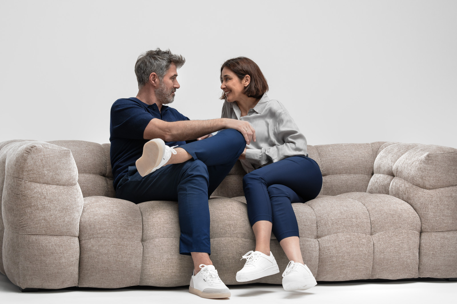 Couple sitting on couch