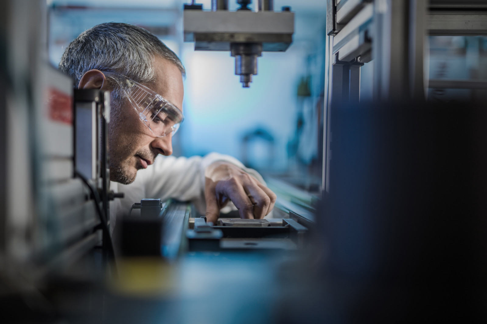Scientist looking at manufacturing line