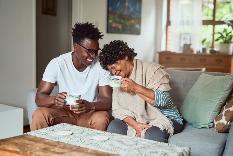 Grandmother and Grandson Enjoying Cup of Coffee