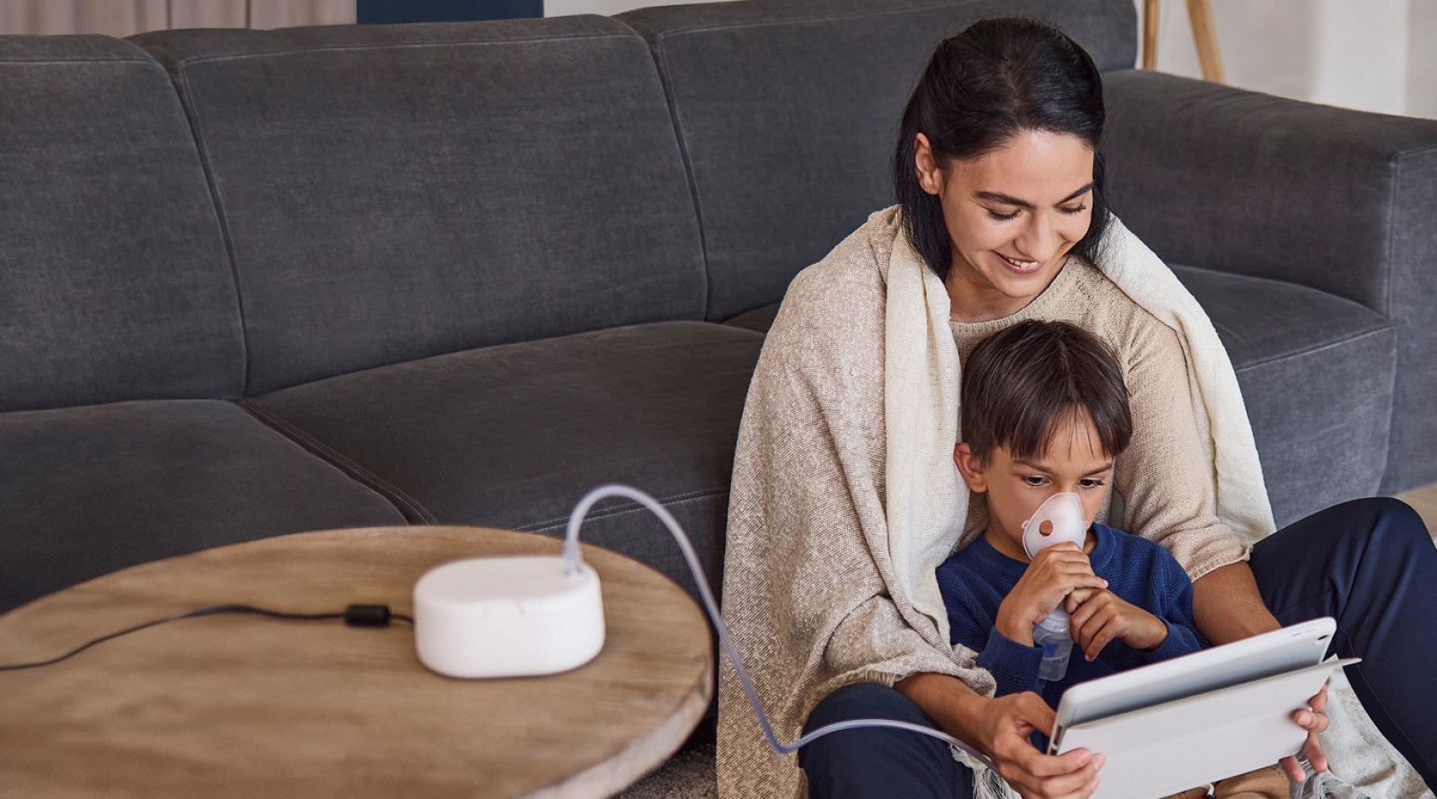 Mother and son sitting on floor NE-C810