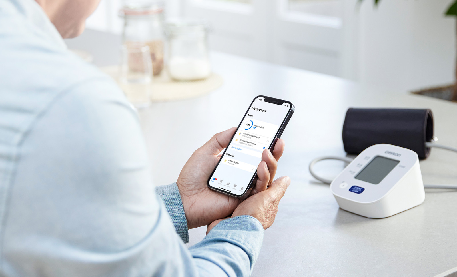 Man looking at app on phone