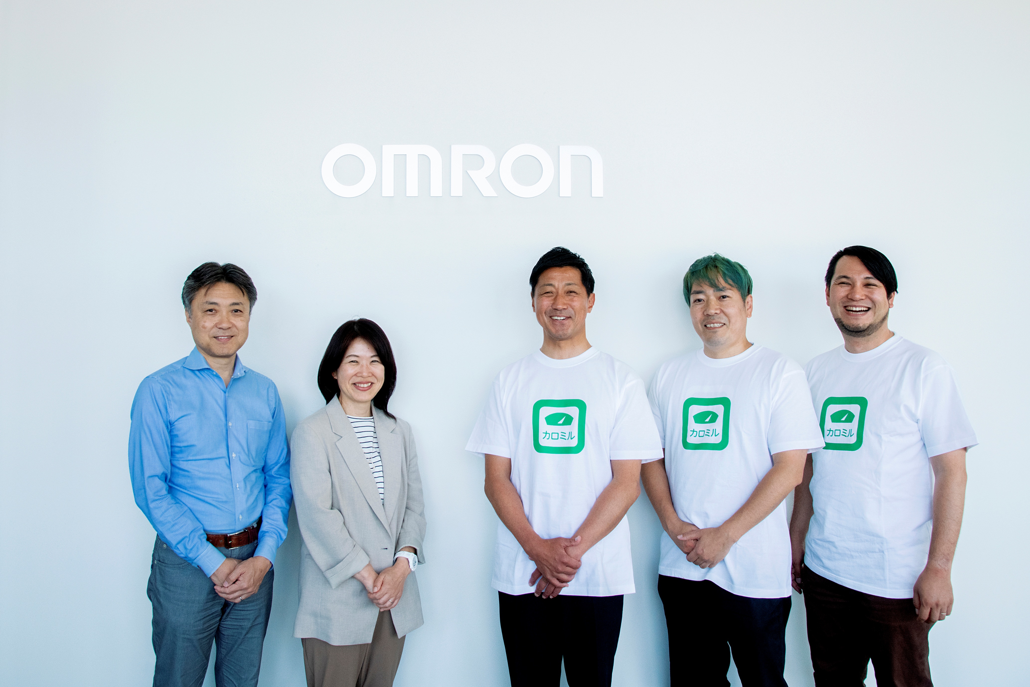 OMRON Healthcare and Life Log Technology, Inc representatives following signing of acquisition agreement.  (Left to right: Tatsuo Noda, Executive Officer and General Manager, Management Strategy HQ, OMRON Healthcare; Ayumu Okada, President and CEO, OMRON Healthcare; Shigeyuki Tanahashi, Co-Founder and CEO, Life Log Technology, Inc; Kodai Aman, Co-Founder and CTO, Life Log Technology, Inc; and Shinichiro Kosuge, CFO, Life Log Technology, Inc)